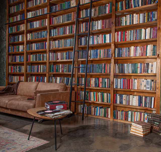 A quiet reading room lined with books